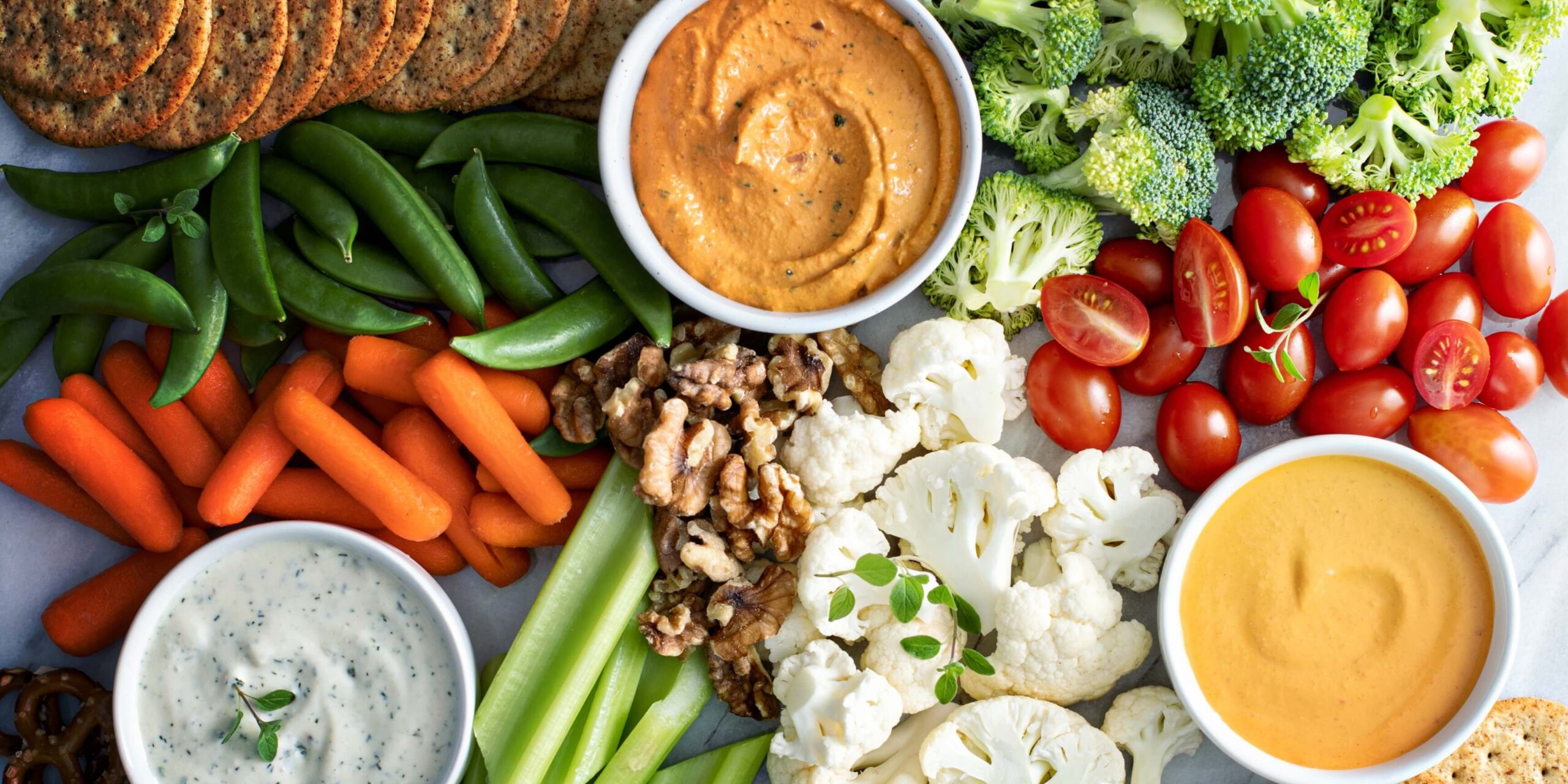 Colourful selection of snacks displayed on a flat surface